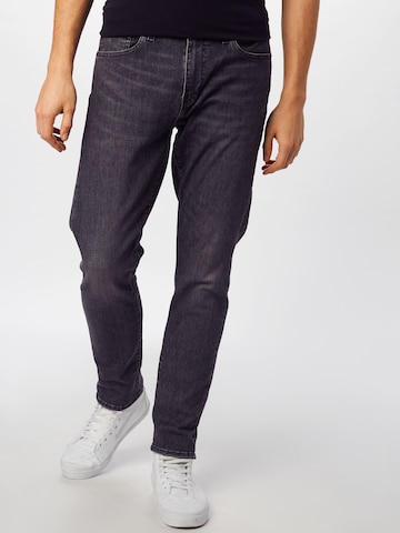 LEVI'S ® Tapered Jeans '512' in Zwart: voorkant