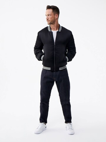 DAN FOX APPAREL Between-Season Jacket 'Jan' in Black