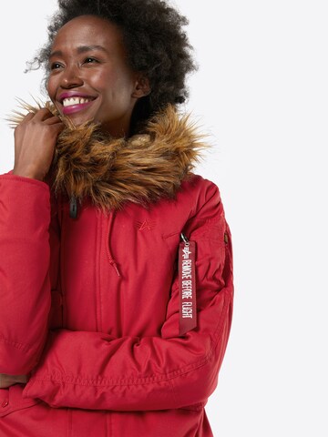 ALPHA INDUSTRIES Välikausitakki 'Explorer' värissä punainen