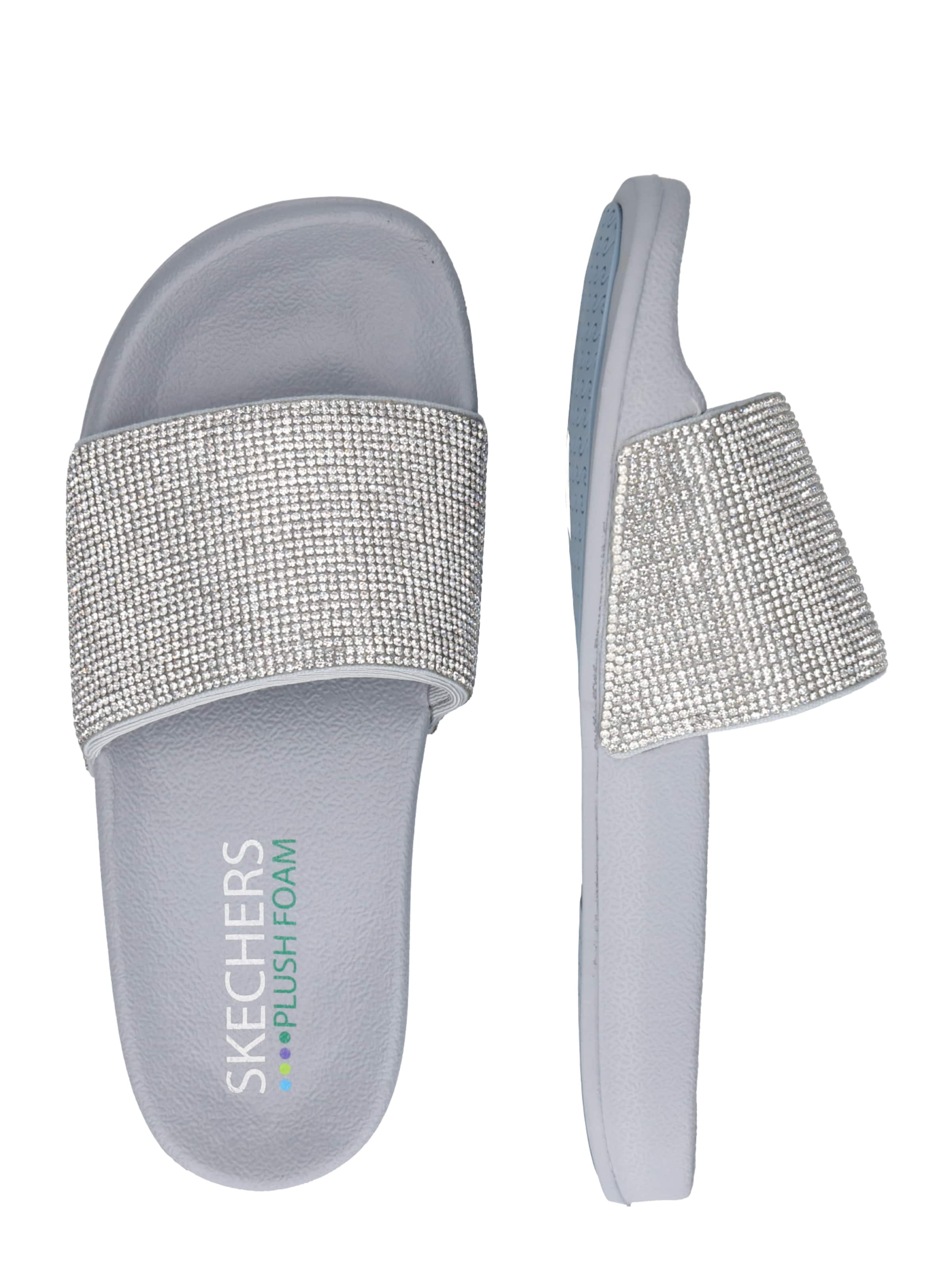 skechers pop ups stone age