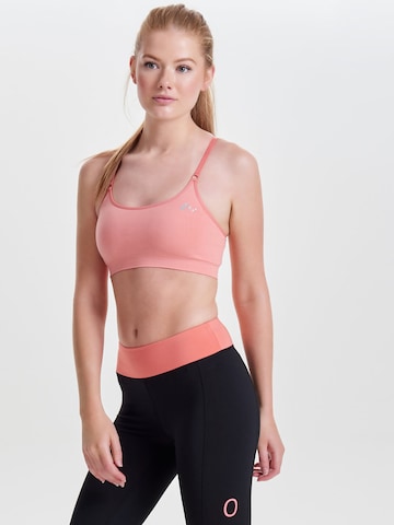 Bustier Soutien-gorge de sport 'ONPLea' ONLY PLAY en orange : devant