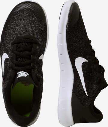 Chaussure de sport 'Free Run 2' NIKE en noir : sur le côté