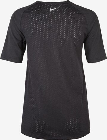 NIKE Koszulka funkcyjna 'Breathe Tailwind' w kolorze czarny: tył