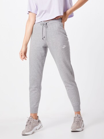 Nike Sportswear Tapered Trousers in Grey: front