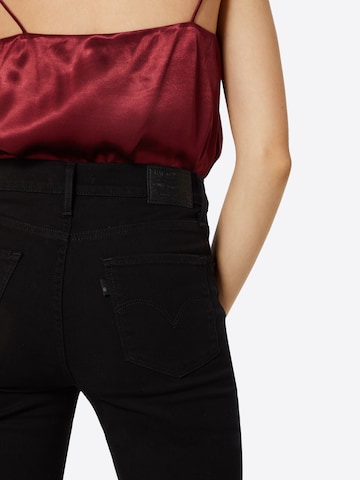 Levi's 724 high rise straight noir hotsell