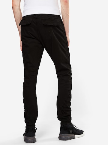 Urban Classics Tapered Trousers in Black