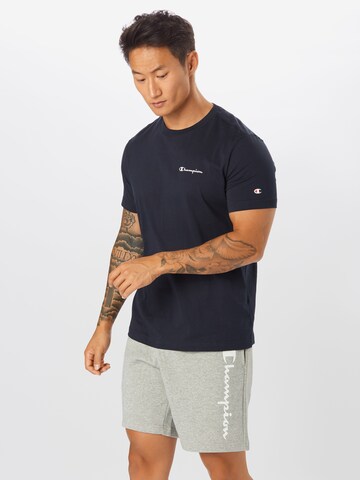 Champion Authentic Athletic Apparel Regular fit T-shirt i blå: framsida