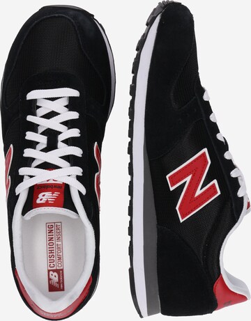 new balance Sneakers laag 'ML311' in Zwart: zijkant