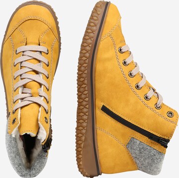 Rieker - Botines con cordones en amarillo