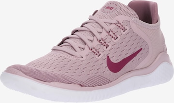 NIKE Běžecká obuv 'Free RN' – pink: přední strana