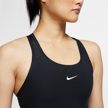 NIKE Bustier Urheilurintaliivit värissä musta