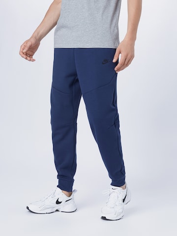 Effilé Pantalon Nike Sportswear en bleu : devant