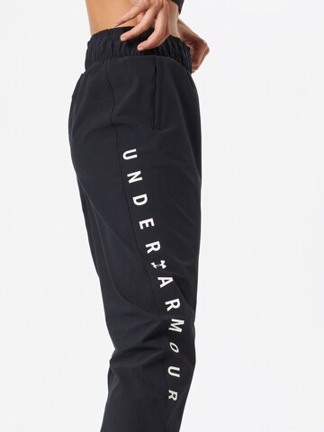 UNDER ARMOUR Tapered Sportbroek in Zwart