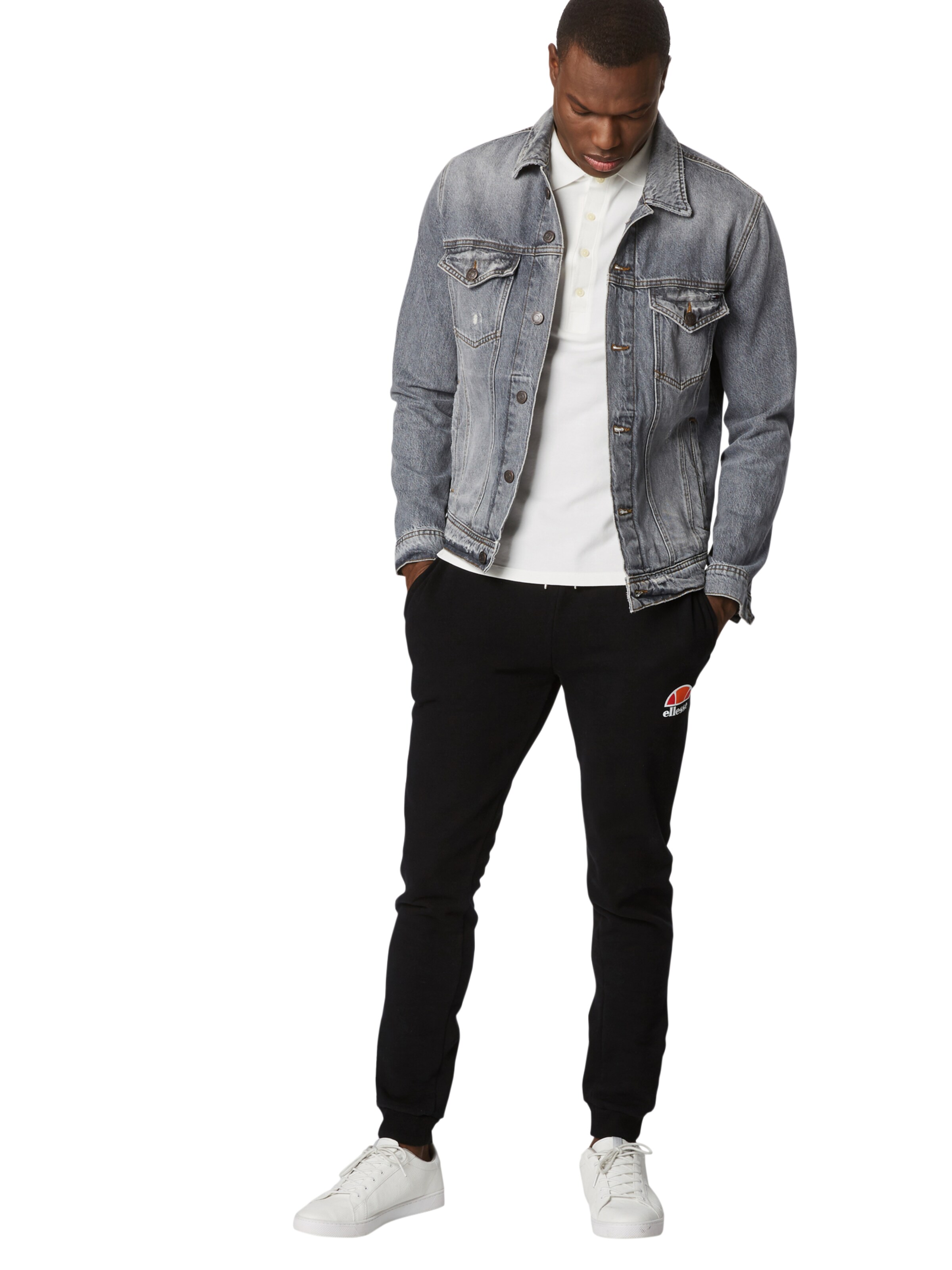 ELLESSE - Tapered Calças de desporto 'Ovest' em preto