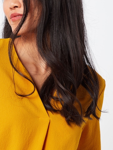 ABOUT YOU - Blusa 'Emmi' em amarelo