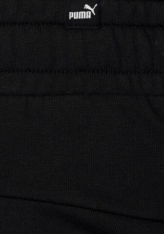 Regular Pantaloni sport de la PUMA pe negru