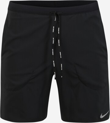 NIKE Regular Workout Pants 'Flex Stride' in Black: front