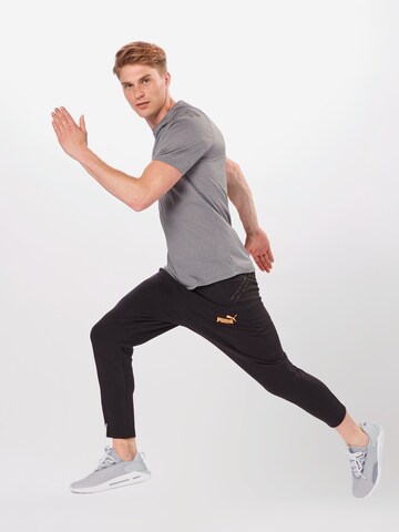 Regular Pantalon de sport PUMA en noir