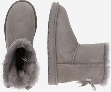 UGG Snow boots 'Mini Bailey Bow II' in Grey: side