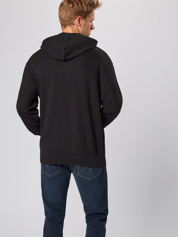 LEVI'S ® Hoodie 'OVERSIZED GRAPHIC' in Schwarz: zadná strana