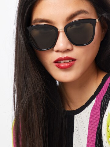 LE SPECS Sunglasses 'Caliente' in Black: front