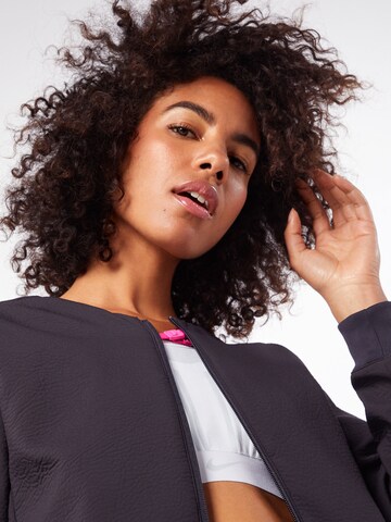 Nike Sportswear Between-season jacket in Black