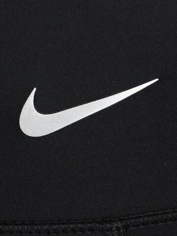 NIKE Skinny Sportbroek in Zwart