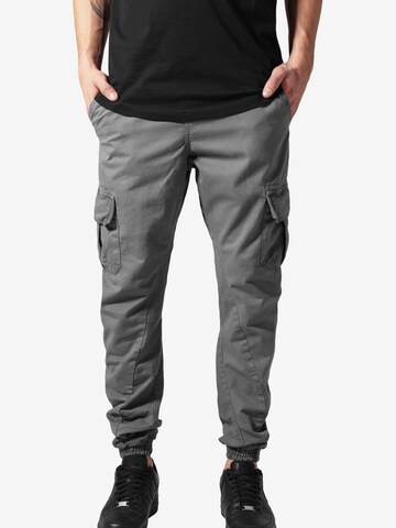 Urban Classics Tapered Cargo Pants in Grey: front