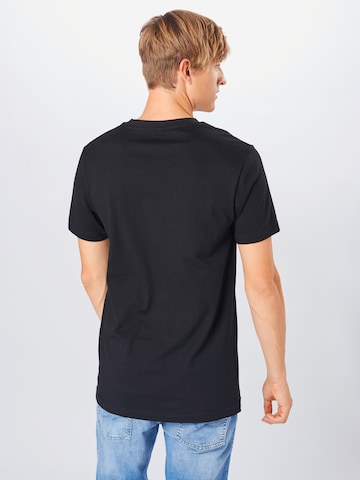 Coupe regular T-Shirt Mister Tee en noir