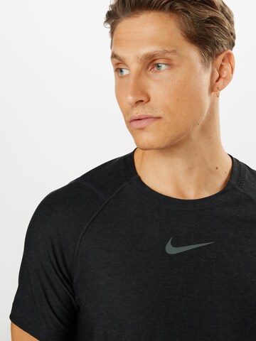 NIKE Regular Fit Funktionsskjorte 'Pro' i sort