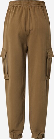 Tapered Pantaloni cargo di Urban Classics in verde