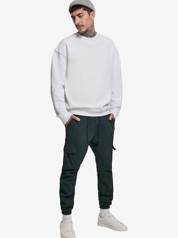 Urban Classics Tapered Gargohousut värissä vihreä