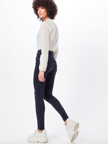 Skinny Jeans di VERO MODA in nero: dietro