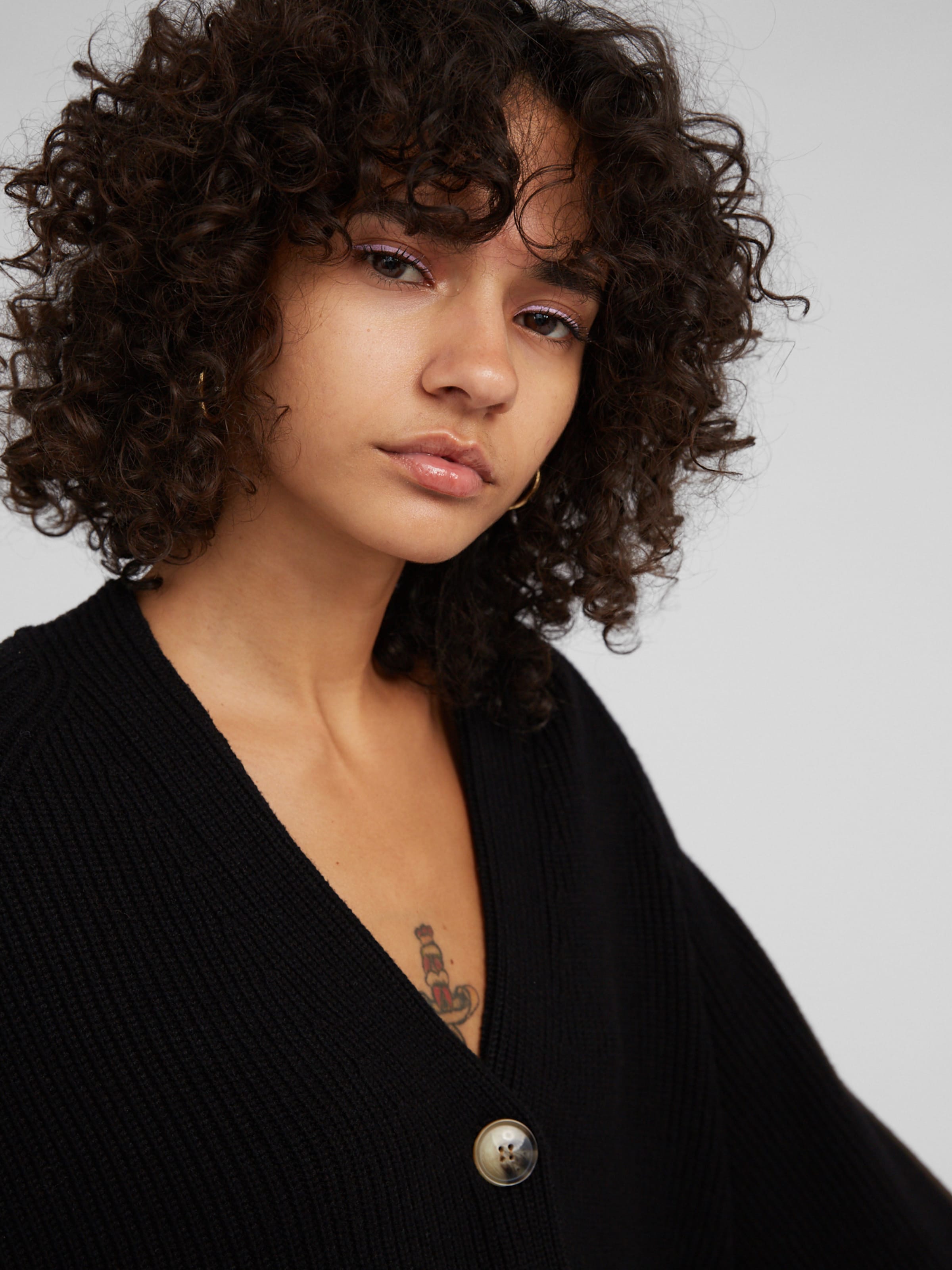 EDITED Strickjacke &#x27;Logan&#x27; in Schwarz