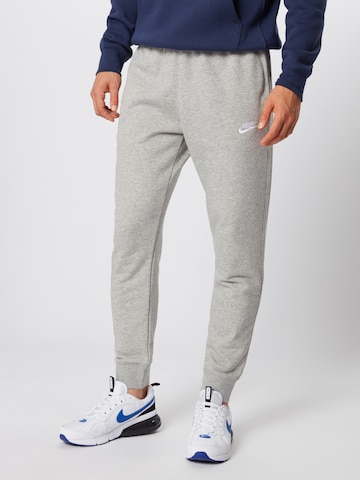 Nike Sportswear Tapered Trousers in Grey: front