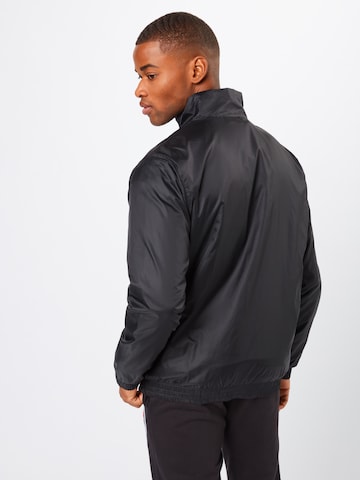 Veste mi-saison Urban Classics en noir : derrière