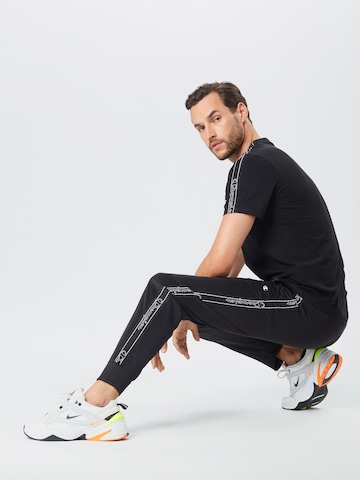 Champion Authentic Athletic Apparel Zúžený Sportovní kalhoty – černá