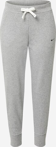 Effilé Pantalon de sport NIKE en gris : devant