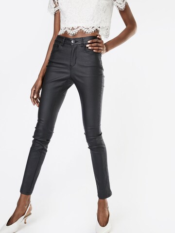 Coupe slim Pantalon heine en noir : devant