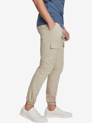 Urban Classics Tapered Cargo trousers in Beige