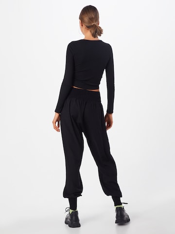 Loosefit Pantaloni de la Urban Classics pe negru: spate