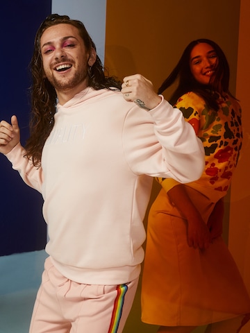 ABOUT YOU x Riccardo Simonetti Tapered Pants 'Robin' in Pink