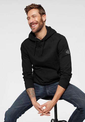 Calvin Klein Jeans Regular Fit Sweatshirt in Schwarz: predná strana