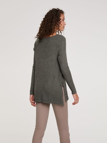 Pull-over heine en vert : derrière