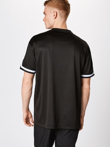 T-Shirt Urban Classics en noir : derrière