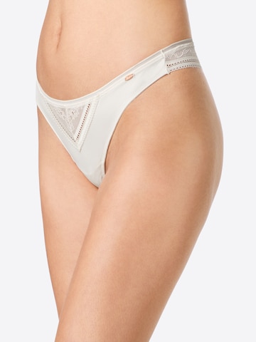 Skiny String i beige: forside