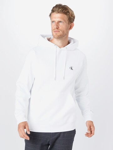 Coupe regular Sweat-shirt Calvin Klein Jeans en blanc : devant