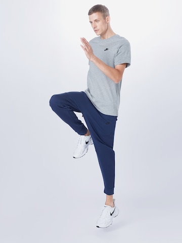 Nike Sportswear Zwężany krój Spodnie w kolorze niebieski