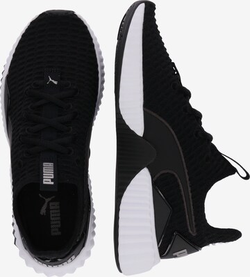 PUMA Buty sportowe 'Defy' w kolorze czarny: bok