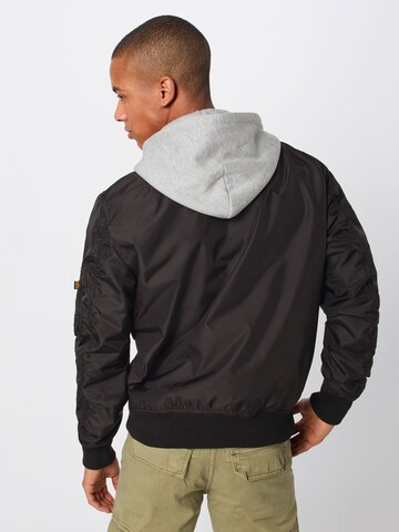 ALPHA INDUSTRIES - Chaqueta de entretiempo en negro: atrás